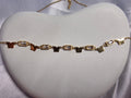 Butterfly and bezel set necklace