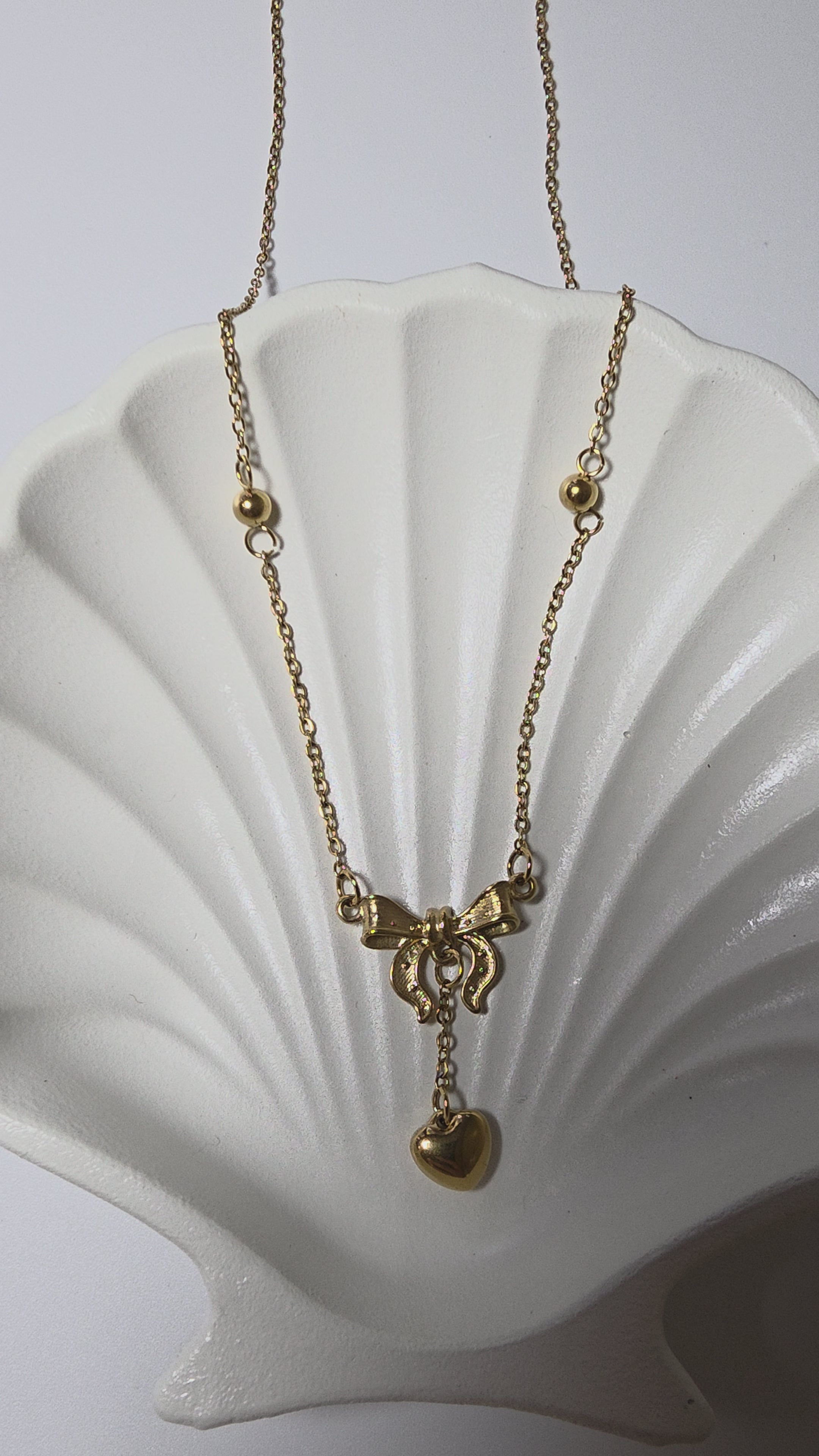 Bow Knot Heart tassle necklace